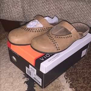 Women’s size 11  Vionic slide on shoes.